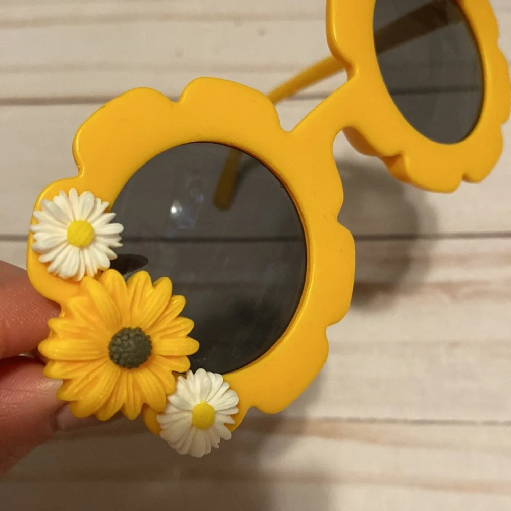 Girls yellow flower shaped sunglasses